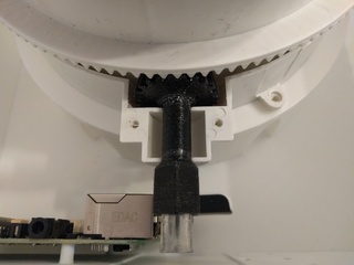 stepper motor and gear adapter attached to case and knitting machine